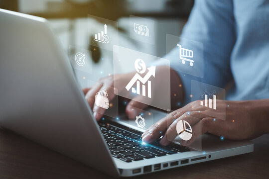Inflation Concept.Man using a laptop with an Increasing diagram of the inflation rate on a virtual screen laptop.financial graph showing statistics, stock market crash, crisis, inflation rate.