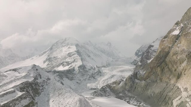 Cinematic Aerial View Over Pasu Glacier. Slow Pan Left