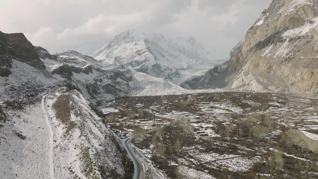 Aerial View Of Valley Floor At Pasu Glacier In Pakistan. Dolly Forward Rising