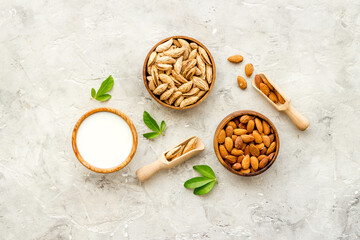 Organic almond milk with almond nuts. Non dairy vegan drink