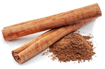 Cinnamon dried bark strips and cinnamon powder, sweet-smelling brown substance used in cooking, isolated on white background.