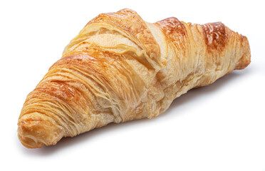 Tasty crusty croissant close-up on a white background.