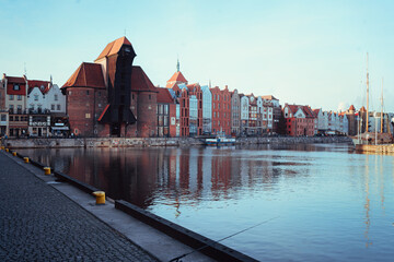 Famous historic Medieval port Crane (Żuraw / Krantor) - one of the Gdańsk water gates.  Morning on the Motlava River. Old town Gdansk (Gdańsk / Danzig), Poland (Polska / Polen). © Olga