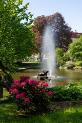 Marianske Lazne (Marienbad) - small lake with fountain in the spa center - green parks in the springtime