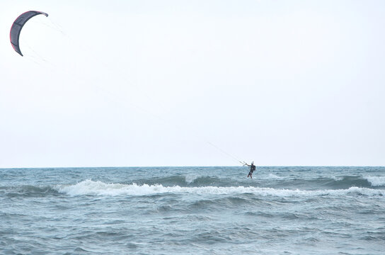 Kite surfing in the sea. Water sports  or summer vacation near the sea concept.