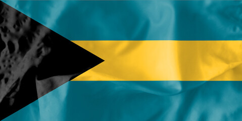 State flag of the Bahamas. The black equilateral triangle symbolizes the unity and determination of the Bahamians. The three horizontal stripes symbolize the natural resources of the islands.