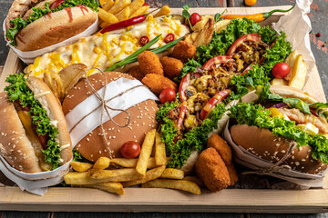Food Buffet Catering Dining Eating Party Sharing Concept. Festival. All kinds of fast food. hot dogs, hamburgers, traditional American food. fast food, Oktoberfest,