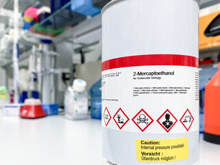 Can with 2-mercaptoethanol - an extremely dangerous substance, labelled with symbols indicating...