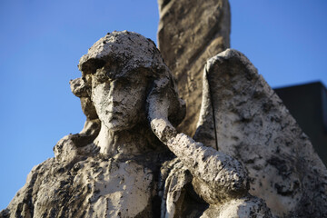 Fototapeta na wymiar Statue in the historic Cimitero Monumentale of Milan