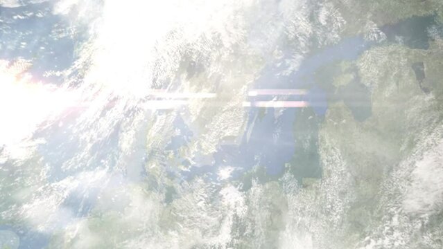 Earth zoom in from outer space to city. Zooming on Vaxjo, Sweden. The animation continues by zoom out through clouds and atmosphere into space. Images from NASA