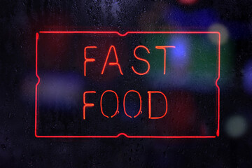 Neon Fast Food Sign in Rainy Window - Powered by Adobe