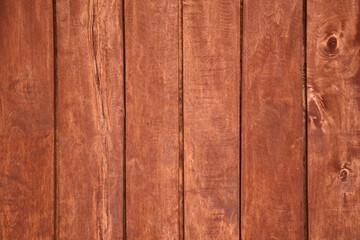 Obraz premium Pionowe drewniane brązowe deski 
