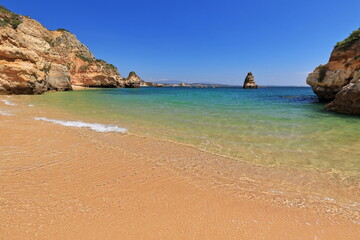 Cliffs and sea stacks-southern section Praia do Camilo Beach. Lagos-Portugal-257