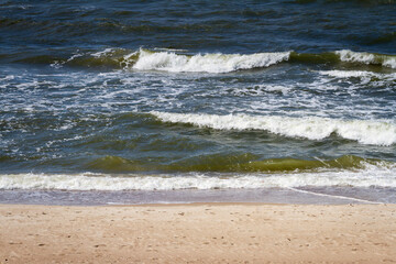 Sand beach and waves