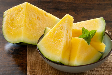 yellow ripe juicy watermelon cut into pieces