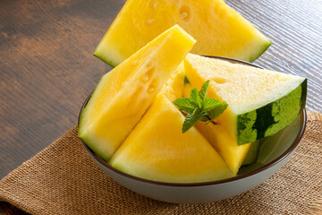 yellow ripe juicy watermelon cut into pieces