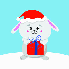 Funny christmas rabbit in a red hat and a gift