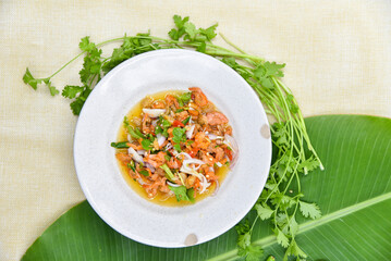 Spicy Dried Shrimp Salad - Thai food, top view on white background.