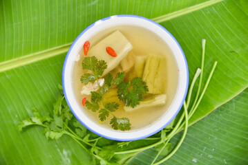 Bitter Gourd Soup with Pork Spare Rib - Thai food, top view on white background.