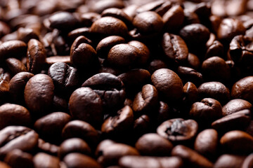 Hot fresh black coffee with milk foam for morning menu in white ceramic cup with coffee beans roasted on.