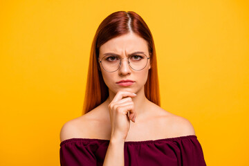 Photo of adorable serious woman wear red outfit eyewear arm chin looking you isolated yellow color background