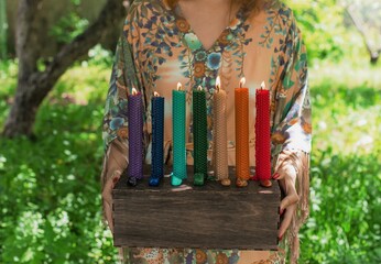 Chakras colorful handmade candles from wax. Energy therapy, mental healing