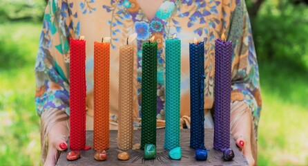 Chakras colorful handmade candles from wax. Energy therapy, mental healing