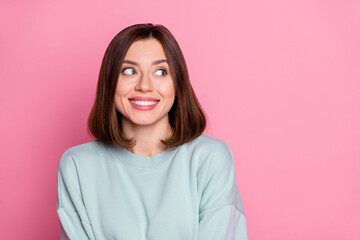 Fototapeta premium Photo of impressed millennial lady look promo wear blue shirt isolated on pink color background