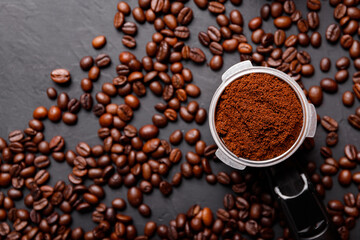 Hot fresh black coffee with milk foam for morning menu in white ceramic cup with coffee beans roasted on.