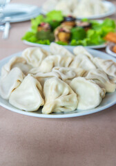 Georgian cuisine khinkali on the table. Selective focus.