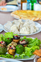Georgian cuisine khinkali on the table. Selective focus.