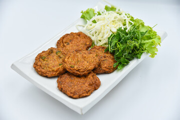 Fried Fish-Paste Balls - Thai food, top view on white background.