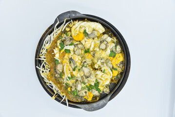 Chinese Oyster Omelette - Thai food, top view on white background.
