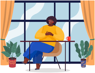 African man relaxing at work. Worker sitting at table, businessman in office. Male employee sitting at desk and having rest during work or studying. Workplace interior and furniture at home