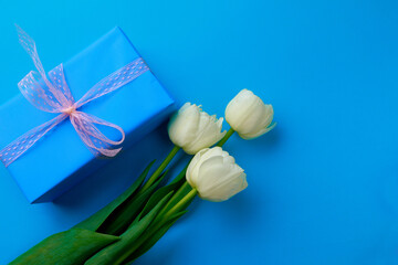  Gift box and Spring flowers on color background. Happy womens day. Happy Mothers day.Hello Spring- Image