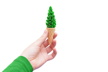 Miniature tree in a waffle cone isolated on white