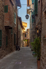 Fototapeta na wymiar Medieval street in the historic center of Passignano, town in Umbria Italy