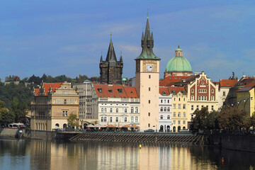 Fototapeta na wymiar Vltava or Moldau river embankment, view from the Charles Bridge, Prague, Czech Republic