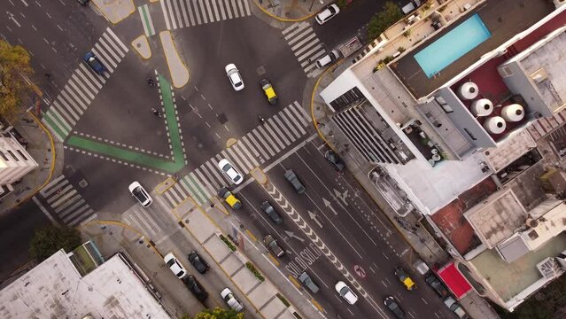 Street corner in Buenos Aires city in Argentina. Aerial top-down rising circling