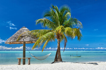 Maldives. Tropical beach. Travel and tourism to luxury resorts in the Maldives islands. Summer holiday concept
