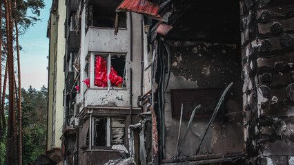 Irpin, Kyiv Oblast,  Ukraine - 19.05.2022: Cities of Ukraine after the Russian occupation. burnt and destroyed civilian building in  city of Irpin, northwest of Kyiv. close up