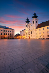 Fototapeta na wymiar Gyor, Hungary. Cityscape image of downtown Gyor, Hungary with Szechenyi Square at sunrise.