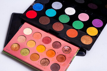 Mua and girly concept. Eyeshadow palette on white background.