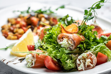 fresh salmon rolls salad with cheese and vegetables. Asian menu. Restaurant menu, dieting, cookbook recipe top view