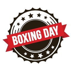 Obraz premium BOXING DAY text on red brown ribbon stamp.