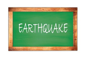 EARTHQUAKE text written on green school board.