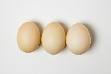 White duck eggs on a white background. Useful and delicious food.