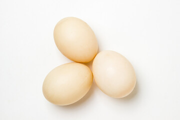 White duck eggs on a white background. Useful and delicious food.