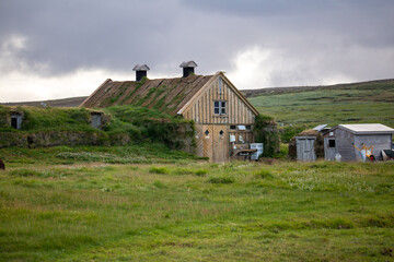Fototapeta na wymiar A cozy, Icelandic house in a field secluded from civilization.