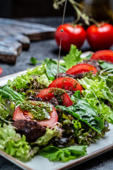 Chicken liver and salad leaves, parmesan cheese and cherry tomatoes. Delicious balanced food concept. vertical image. top view. place for text